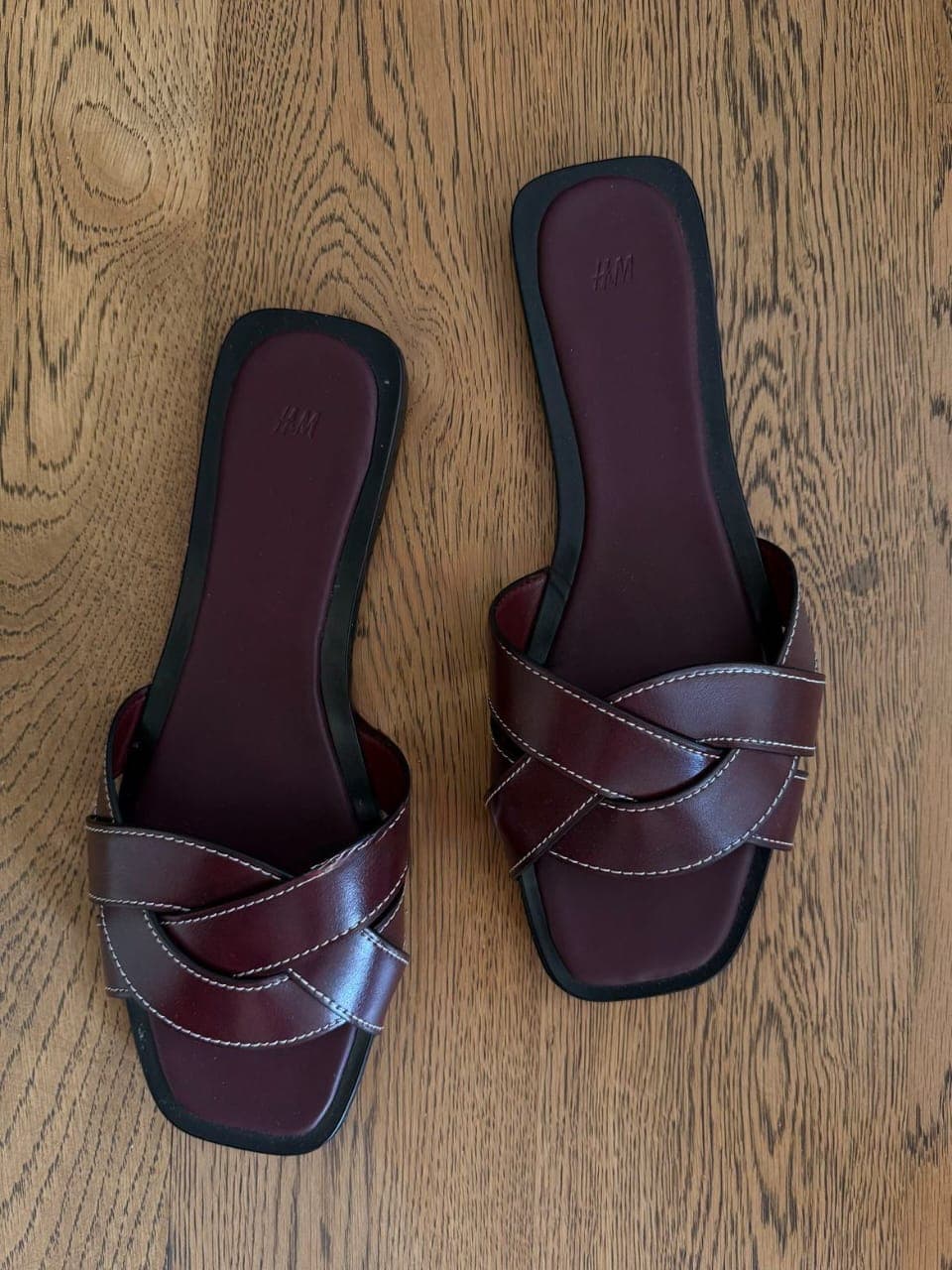 NOVEQ The Twist Slide Pam top perspective showing contrast white artisan stitching