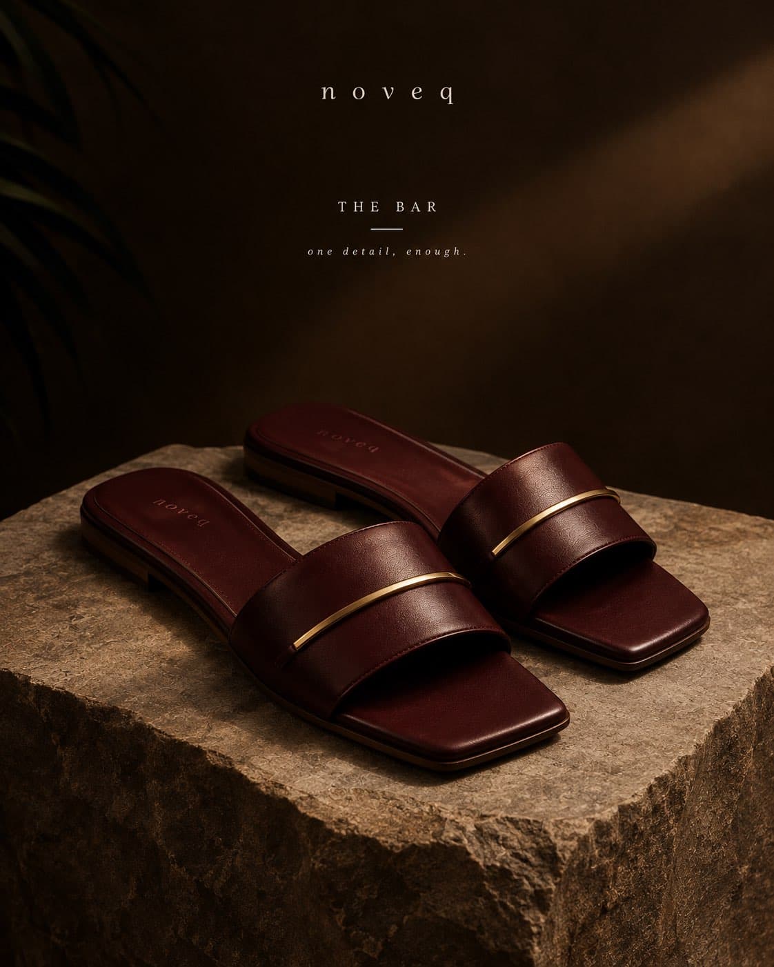 NOVEQ The Bar Slide Pam in rich oxblood leather with solid brass bar detail