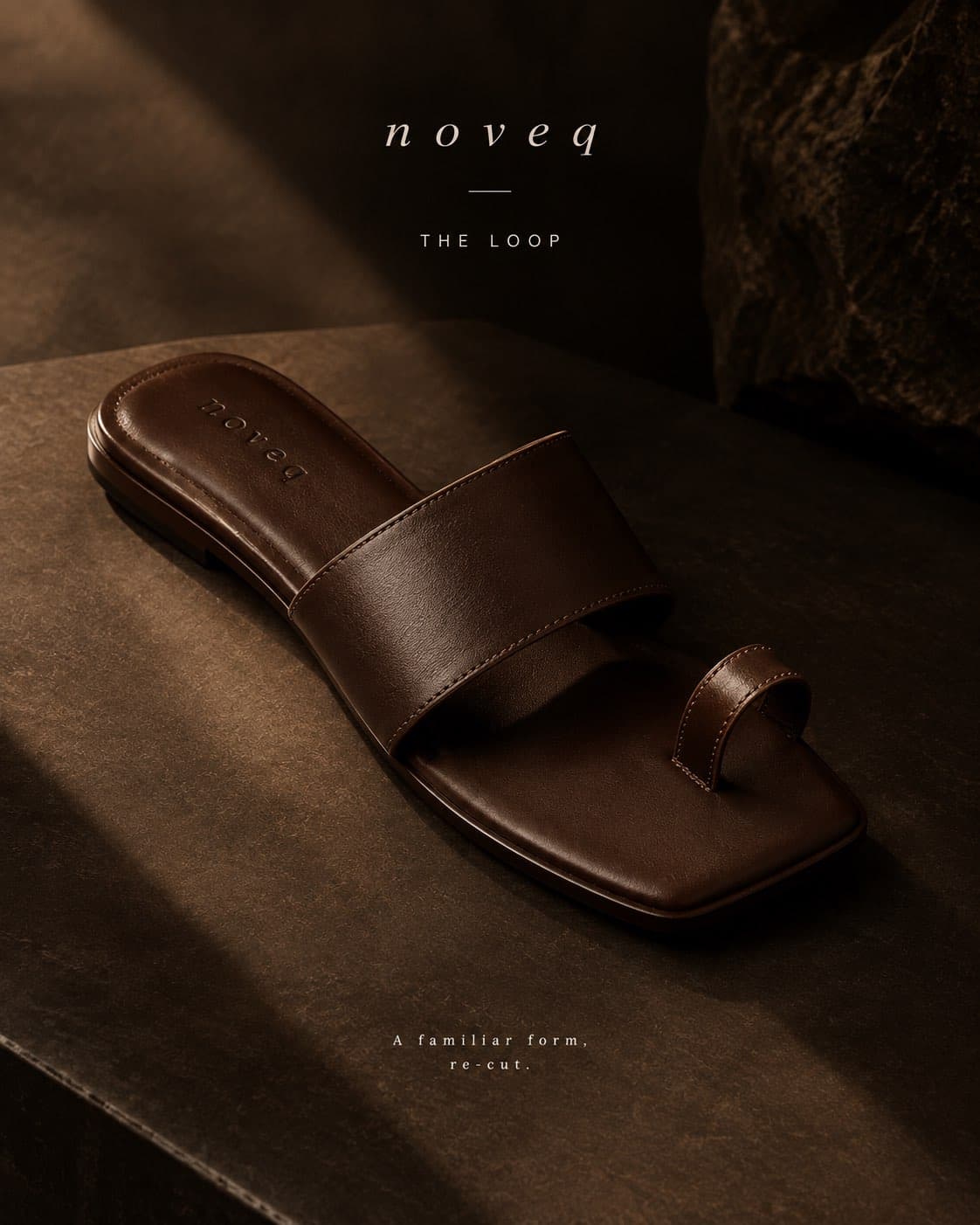 NOVEQ The Loop Pam in rich chocolate leather on dark stone